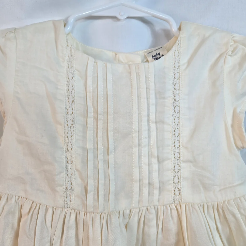 OshKosh B'gosh Baby Girl Ivory Bow Cap Sleeve Lined Front Pleat Light Dress 24Mo